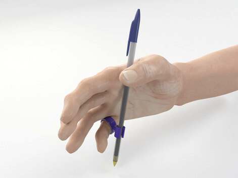 The Grippit - A durable pen grip for right and left handed use